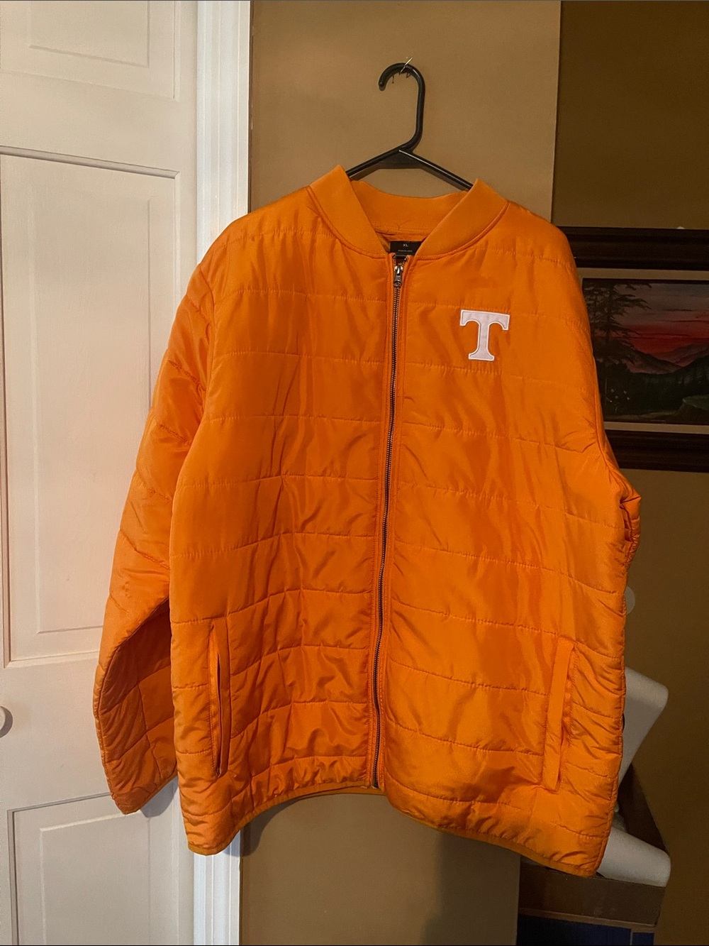 Orange Quilted Jacket with White 'T' Patch